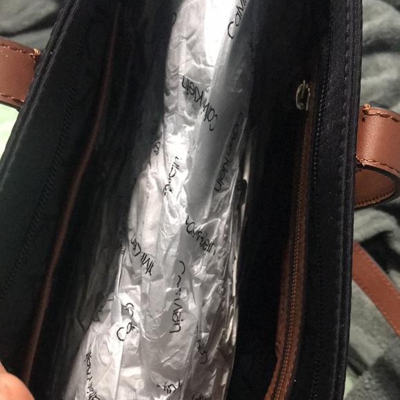 Calvin Klein black and brown purse.